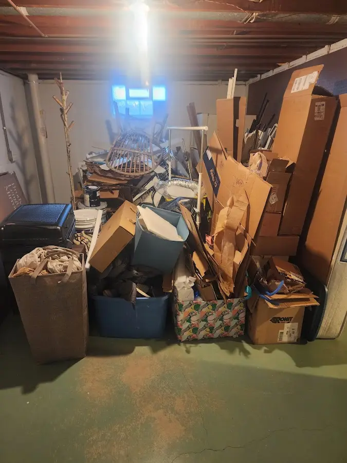 Roll-off dumpster container at job site for 2 Yard Dumpster Rental in Town and Country